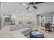 Bright living area with a plush sectional sofa and a stylish accent table at 11544 W Ashby Dr, Peoria, AZ 85383