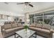 Open floor plan showing a living room that flows into kitchen and dining area at 11544 W Ashby Dr, Peoria, AZ 85383