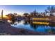 Picturesque Vistancia entrance with a serene pond and cascading waterfall creating a welcoming ambiance at 11544 W Ashby Dr, Peoria, AZ 85383