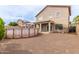 Spacious backyard with an above-ground pool and exterior view of the home at 13001 W Bloomfield Rd, El Mirage, AZ 85335