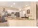 Bright kitchen featuring stainless steel appliances and granite countertops at 13001 W Bloomfield Rd, El Mirage, AZ 85335