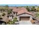 Charming home with a tile roof, desert landscaping, and mountain views at 13064 W Big Oak St, Peoria, AZ 85383