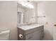 Bathroom highlighting a grey granite vanity and modern fixtures at 13275 W Bolero Dr, Sun City West, AZ 85375