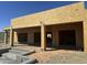 Exterior of home featuring a large garage, pool, and outdoor living space under construction at 13515 N Granite Way, Fountain Hills, AZ 85268