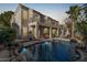 Beautiful backyard with a pool, patio, and manicured landscaping, ideal for outdoor entertaining at 1449 W Commerce Ave, Gilbert, AZ 85233