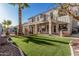 Expansive backyard with pool, manicured lawn, and outdoor living spaces, perfect for entertaining and relaxation at 1449 W Commerce Ave, Gilbert, AZ 85233