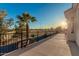 Enjoy outdoor relaxation on this balcony with views of the neighborhood sports field at 1449 W Commerce Ave, Gilbert, AZ 85233