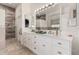 Bright bathroom showcasing double sinks, modern fixtures, and large counter space at 1449 W Commerce Ave, Gilbert, AZ 85233