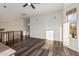 Loft area featuring laminate floors and large windows with a view at 1449 W Commerce Ave, Gilbert, AZ 85233