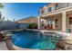 Refreshing pool and landscaped backyard, perfect for outdoor enjoyment and relaxation at 1449 W Commerce Ave, Gilbert, AZ 85233