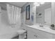 Clean bathroom with a shower-tub combination, white vanity, and modern fixtures at 1475 E Runaway Bay Dr, Chandler, AZ 85249