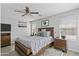 Serene bedroom featuring a plush bed, modern furniture, and ample natural light at 1475 E Runaway Bay Dr, Chandler, AZ 85249