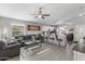 Open-concept living area with kitchen featuring a breakfast bar and stylish furnishings at 1475 E Runaway Bay Dr, Chandler, AZ 85249