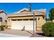 A lovely house featuring a two-car garage and a basketball hoop in the driveway at 1552 E Shannon St, Chandler, AZ 85225