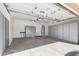 Spacious garage with ample storage, overhead lighting, and concrete flooring at 1552 E Shannon St, Chandler, AZ 85225