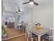 An inviting dining area features a mirrored wall, modern table set, and bright light at 1942 S Emerson -- # 127, Mesa, AZ 85210