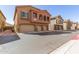 Charming homes with well-manicured landscaping, featuring three-car garages and stylish exteriors at 2024 S Baldwin St # 161, Mesa, AZ 85209