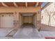 Spacious two-car garage with ample room for parking and storage, featuring a modern door at 2024 S Baldwin St # 161, Mesa, AZ 85209