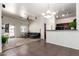 Spacious living room with plush carpet and access to a private balcony at 2024 S Baldwin St # 161, Mesa, AZ 85209