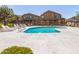 Community pool surrounded by lounge chairs, perfect for relaxation and summer fun at 2024 S Baldwin St # 161, Mesa, AZ 85209