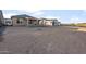 Unfinished desert backyard perfect for customizing to create your ideal outdoor living space at 21281 N 270Th Dr, Buckeye, AZ 85396