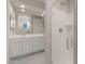 Contemporary bathroom with double vanity, sleek shower, and modern fixtures at 21281 N 270Th Dr, Buckeye, AZ 85396