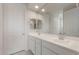 Bathroom featuring double sink vanity, large mirror, and ample counter space at 21281 N 270Th Dr, Buckeye, AZ 85396