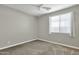 Bedroom featuring a ceiling fan, window and blinds at 2483 E Narrowleaf Dr, Gilbert, AZ 85298