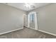 Bedroom featuring a ceiling fan, window and blinds at 2483 E Narrowleaf Dr, Gilbert, AZ 85298