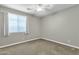 Bright bedroom with carpet floors and ample natural light at 2483 E Narrowleaf Dr, Gilbert, AZ 85298