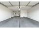Garage featuring an automatic door opener and plenty of space at 2483 E Narrowleaf Dr, Gilbert, AZ 85298