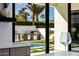 Outdoor living space featuring a built-in grill, mini-fridge, and in-ground pool, perfect for relaxation and entertainment at 2642 N Fiesta St, Scottsdale, AZ 85257