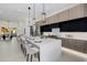 Bright and airy kitchen with expansive island, perfect for entertaining, and open to the living and dining spaces at 2642 N Fiesta St, Scottsdale, AZ 85257