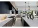 Modern kitchen with stainless steel appliances, a sleek backsplash, and stylish fixtures, creating a culinary haven at 2642 N Fiesta St, Scottsdale, AZ 85257