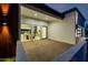 Spacious back patio with large glass doors offering views of a dining room with a fireplace and modern decor at 2642 N Fiesta St, Scottsdale, AZ 85257