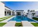Beautiful backyard pool with lounge chairs and lush landscaping, ideal for relaxation and outdoor enjoyment at 2642 N Fiesta St, Scottsdale, AZ 85257