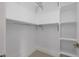 Spacious walk-in closet boasts ample shelving and hanging space for storage at 2642 N Fiesta St, Scottsdale, AZ 85257