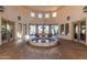 Beautiful lobby featuring a decorative fountain, tile flooring, several windows and access to other parts of the community at 3131 E Legacy Dr # 2018, Phoenix, AZ 85042