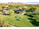 Aerial view of the community dog park, which features grass and play equipment for your pets at 32215 N 16Th Ave, Phoenix, AZ 85085