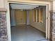 Garage with epoxy flooring and natural light at 32215 N 16Th Ave, Phoenix, AZ 85085
