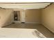 Epoxy floored and clean garage with updated utility closet at 32215 N 16Th Ave, Phoenix, AZ 85085