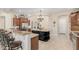 Open kitchen with granite countertops, stainless steel appliances, and a large island at 32215 N 16Th Ave, Phoenix, AZ 85085