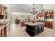 Gourmet kitchen featuring granite countertops, stainless steel appliances, and a center island at 32215 N 16Th Ave, Phoenix, AZ 85085