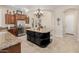 Spacious kitchen with a center island, stainless appliances, and custom cabinets at 32215 N 16Th Ave, Phoenix, AZ 85085