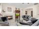 Comfortable living room showcasing a fireplace, built-in shelving, and inviting seating at 32215 N 16Th Ave, Phoenix, AZ 85085