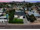 Charming single-Gathering home featuring a manicured lawn and a private backyard pool, offering a serene living environment at 3516 E Earll Dr, Phoenix, AZ 85018