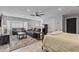 Spacious basement area including lounging area and bed with neutral decor and recessed lighting at 3516 E Earll Dr, Phoenix, AZ 85018