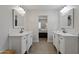 An elegant bathroom offers dual vanities with marble countertops and modern fixtures at 3516 E Earll Dr, Phoenix, AZ 85018