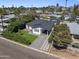 Charming home with well-manicured lawn, and beautiful landscaping in a desirable neighborhood at 3516 E Earll Dr, Phoenix, AZ 85018