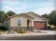 Charming single-story home with a two-car garage and beautifully landscaped front yard at 362 S Calle Miguel --, Casa Grande, AZ 85194